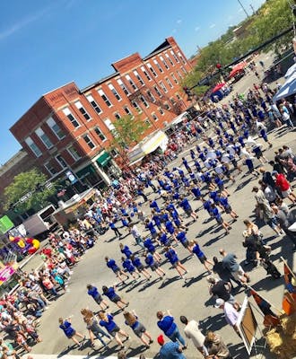 An image of the Blue Lions High School Band performing at the Scarecrow Festival 